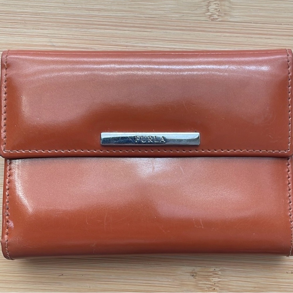 Sleek FURLA 3-Fold Wallet patent leather in burnt orange
